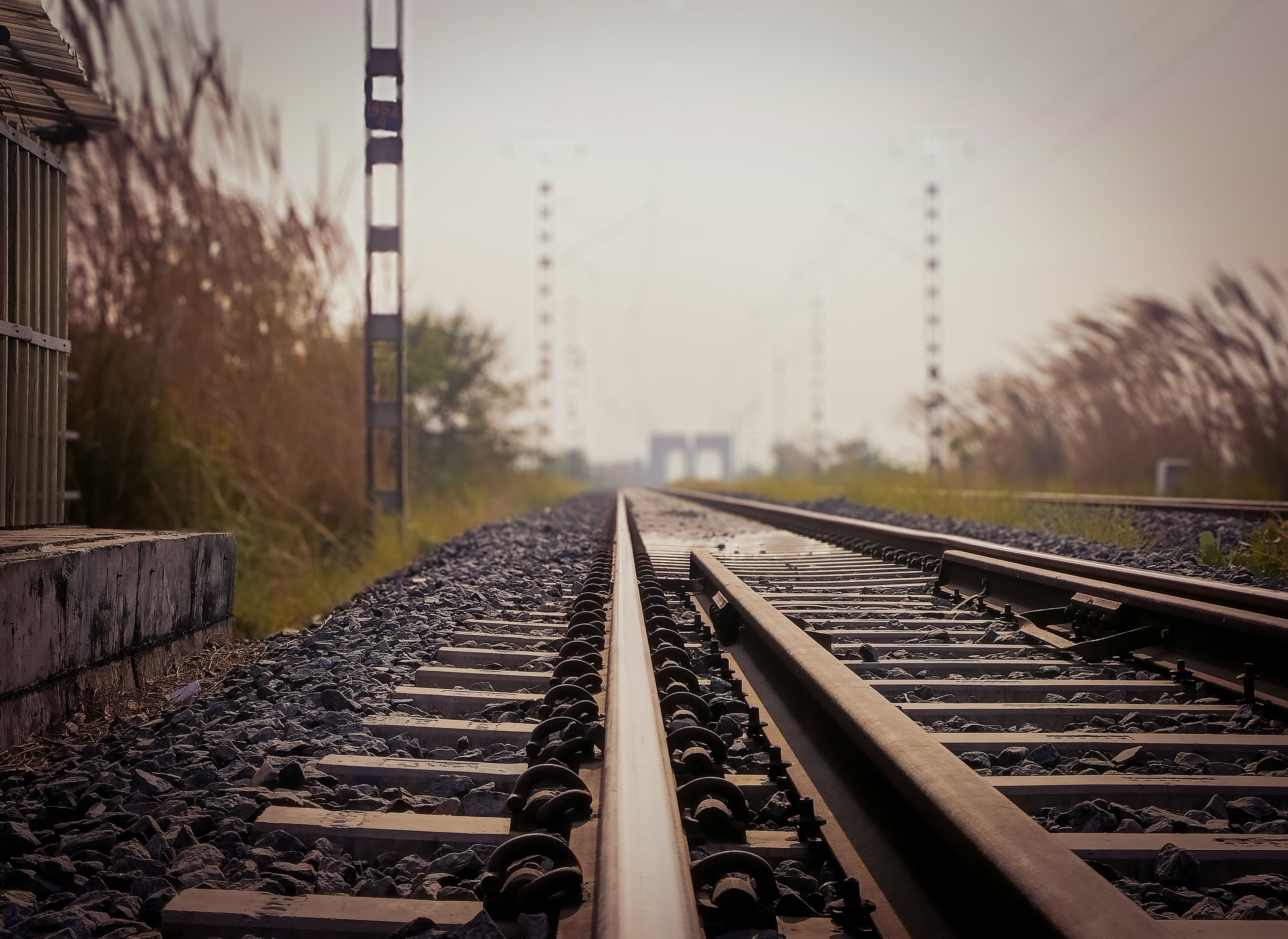 Railway track and signal infrastructure receding into the distance
